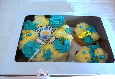 Manchester City FC themed bento cake with matching sky-blue and gold cupcakes